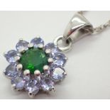 Silver tanzanite and green stone pendant on silver chain