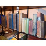 Two shelves of antiquarian books