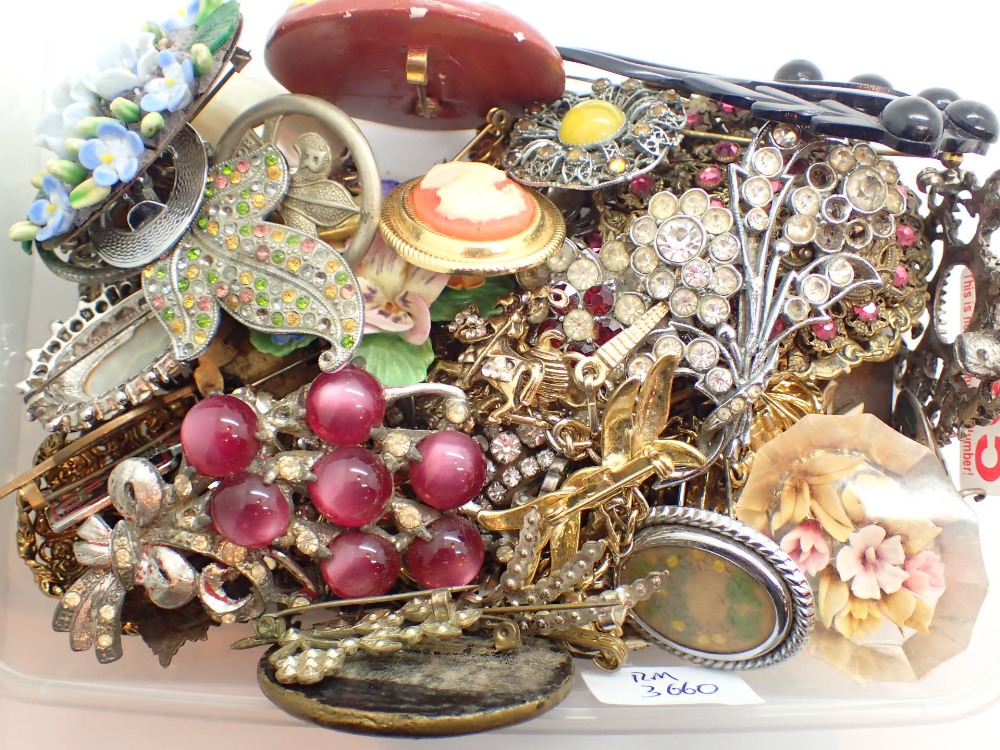 Box of vintage mixed metal brooches