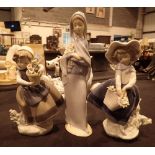 Three Lladro figurines three girls with flowers tallest H: 20 cm
