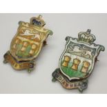 Pair of hallmarked silver and enamel crest badges marked Indian Head