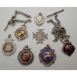 Six hallmarked silver albert fobs and associated chain T-bars clips and a 1890 medal to Sgt B Hill