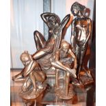 Four cast resin bronzed female figurines tallest H: 25 cm