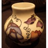 Moorcroft vase in the Sweet Pea pattern H: 9 cm