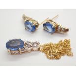 10K gold ( hallmarked as 9ct ) blue stone and diamond earring and pendant set including 10K gold