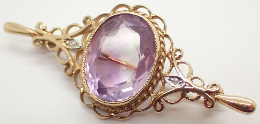 9ct gold amethyst set fancy brooch 6.