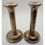 Hallmarked silver pair of Victorian candlesticks with swag and bow design assay Birmingham 1802 H: