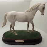 Beswick matte horse Desert Orchid on a wooden stand