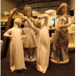 Three Lladro and one Nao figurines of various styles tallest H: 25 cm