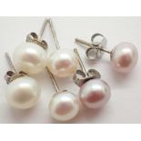 Three pairs of new old stock genuine pearl and silver stud earrings