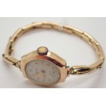 9ct yellow gold Omer ladies cocktail wristwatch with 9ct gold metal lined expanding strap total