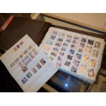 Large album of mixed worldwide postage stamps