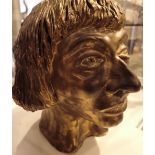 Large bronzed bust of a head by Karl F Hodgson signed indistinctly lower left H: 30 cm