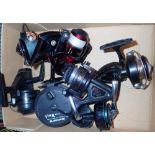 Six coarse fishing reels and a fly reel
