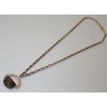 9ct yellow gold chain with smokey quartz gold mounted spinner fob 11.