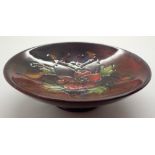 Moorcroft Flambe footed bowl in the Columbine pattern CONDITION REPORT: Small patch