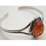 Silver cabochon oval amber set bangle