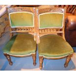 Three upholstered Edwardian dining carved oak chairs