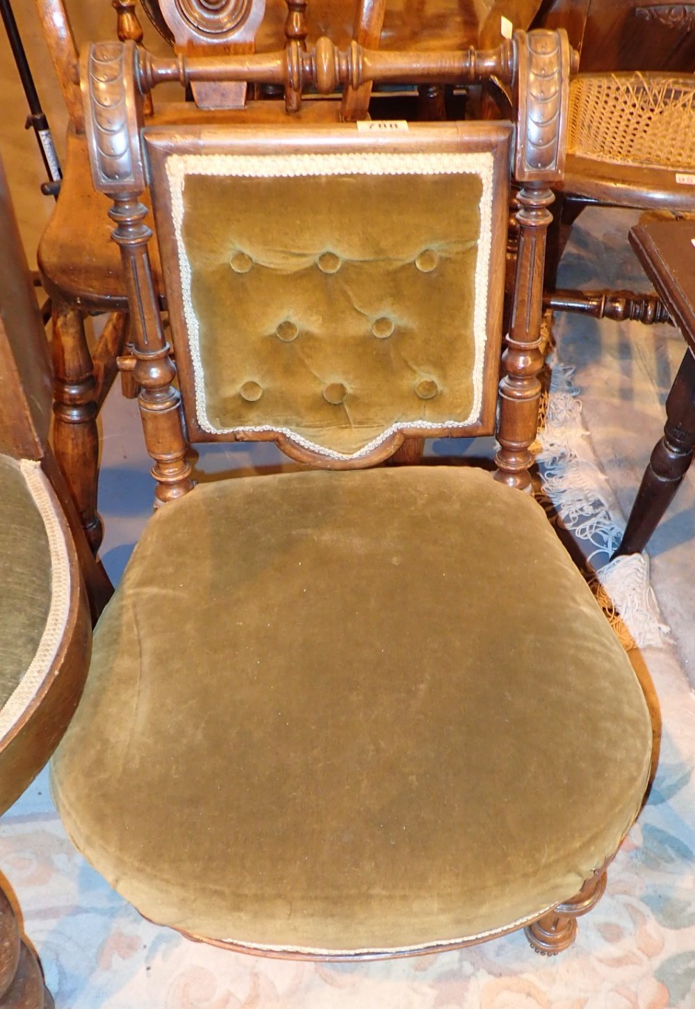 Small carved walnut upholstered chair