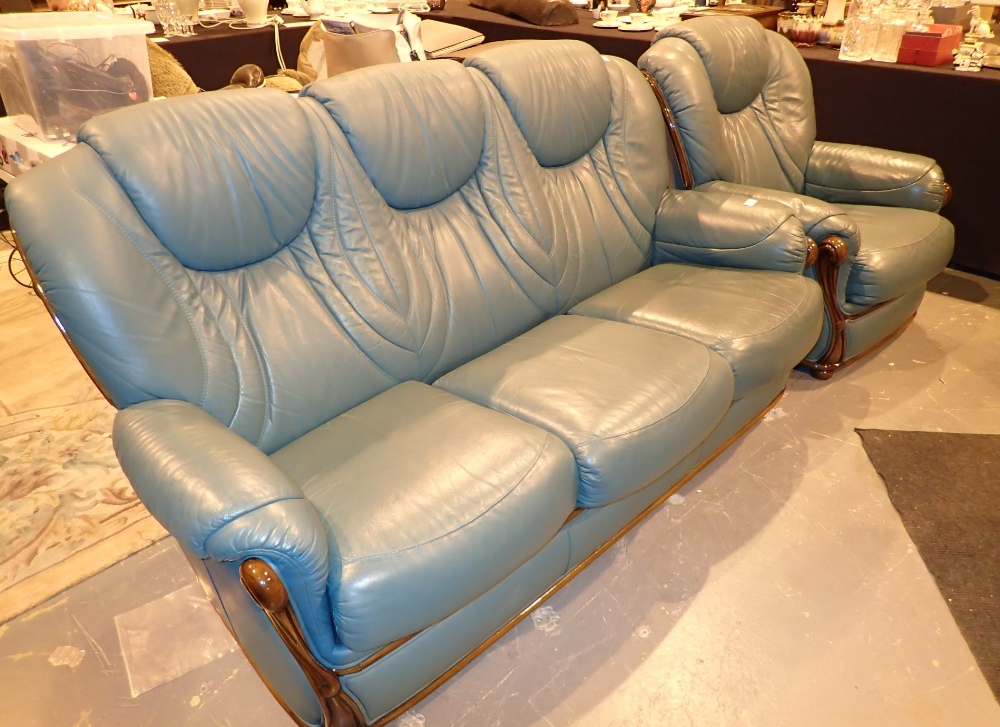 Green leather three seater settee and chair