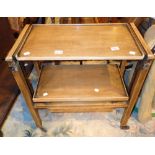 Gold Oak metamorphic table wagon with lower drawers