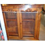 Victorian walnut glazed bookcase with carved detail 110 x 29 x 102 cm H