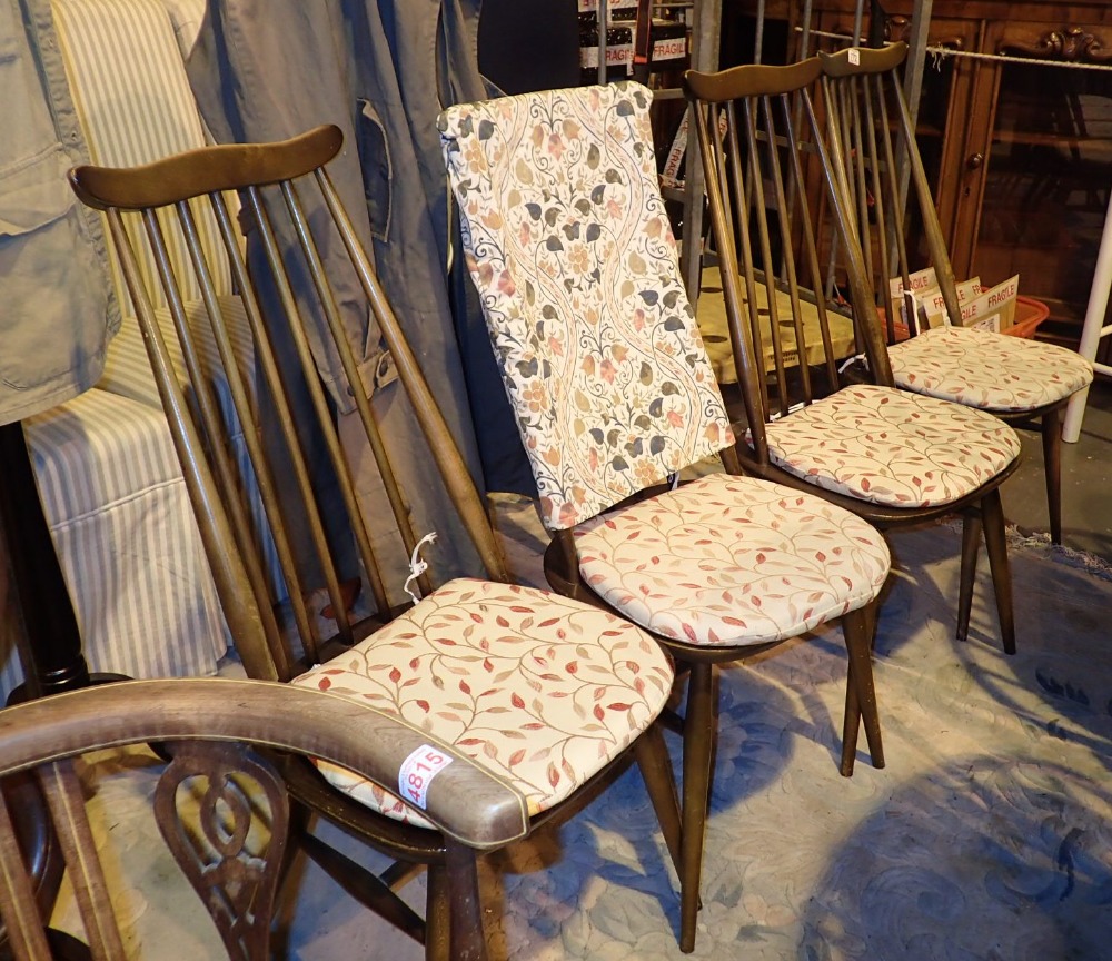 Four Ercol stickback dining chairs