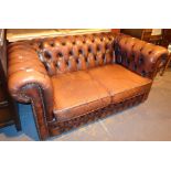 Two seater leather button back Chesterfield