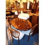 Mahogany tilt top breakfast table on tripod base with six modern upholstered shield back dining