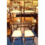 Four upholstered inlaid stickback chairs including two carvers