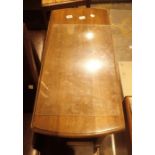 Oak folding oval table with barleytwist legs