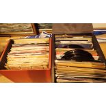 Two boxes of 45 RPM single records 1950 - 70s including Elvis Presley