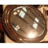 Two large oval mirrors