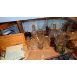 Shelf of glass and ceramics with hip flask