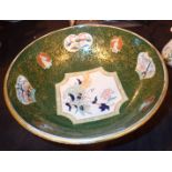 Large Oriental style fruit bowl by Ashworth in green and gold with flower panels
