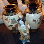 Pair of Japanese Satsuma vases H: 23 cm and a figural candlestick