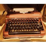 Cased Olympic typewriter