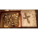 Three pieces of vintage costume jewellery including belt buckle cross and scarf clip