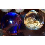 Two decorative paper weights one by Caithness
