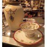 Art Nouveau vase by Crown Devon and a miniature cup and saucer by Victoria Ware decorated with