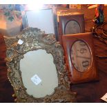 Collection of photo frames to include vintage heavy brass frame in Art Nouveau style with swags and