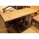 Cast iron Singer sewing machine base with granite worktop