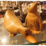 Carved wooden penguin and duck by DCUK