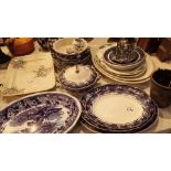 Large blue and white serving plates with further platters etc