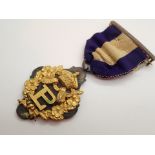 Gilt metal Special Service 1887 medal an