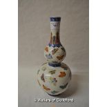 A Chinese polychrome double gourd vase decorated with butterflies, 29cm..