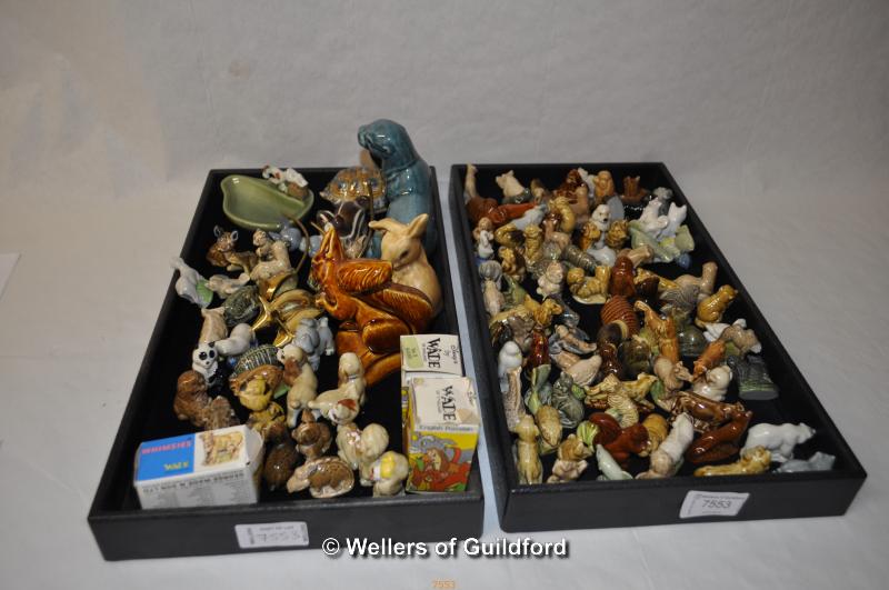 A large quantity of Wade Whimsies including two boxed Disney examples; Poole squirrel and otter;