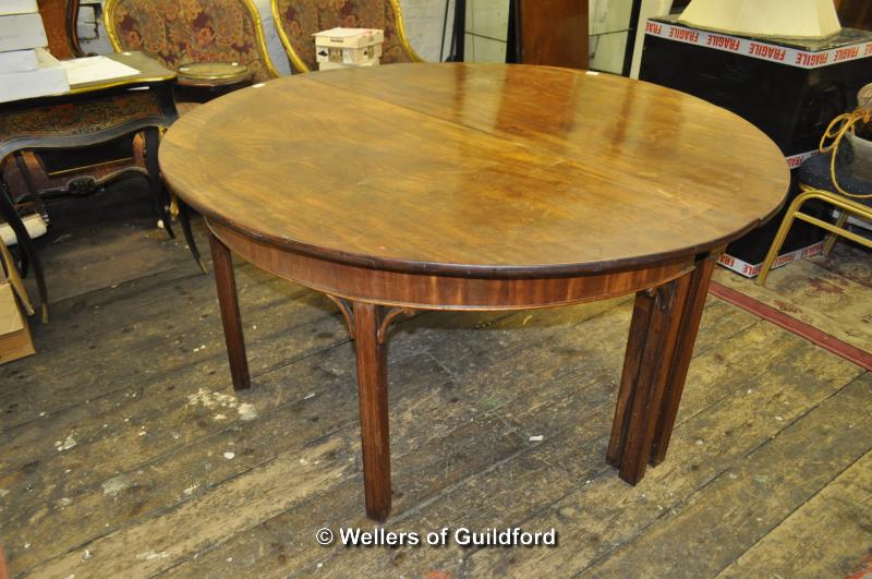 A large 19th Century circular mahogany dining table with gateleg action, later crossbanding and with - Image 3 of 3