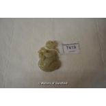 A Chinese pale green jade pendant carved as a boy sitting on a duck, 5cm.