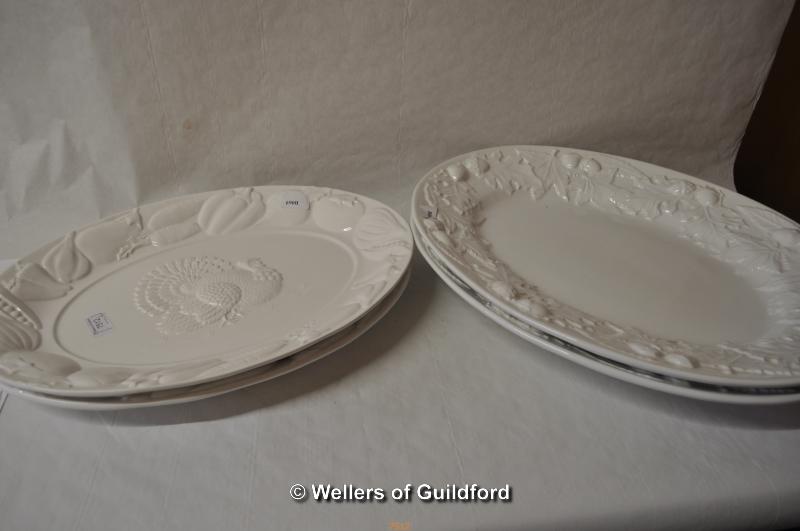 Two pairs of modern white turkey platters, the largest pair 51cm.